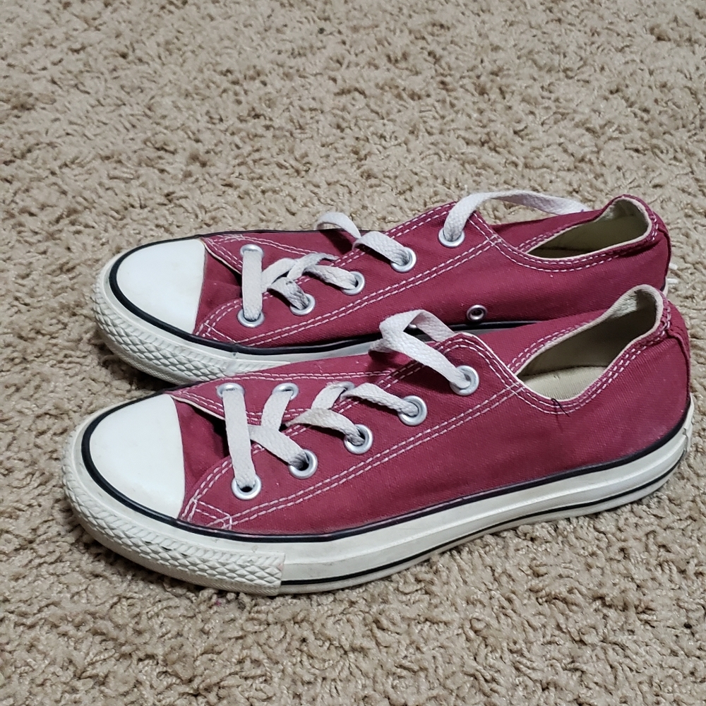 Maroon Converse sneakers
